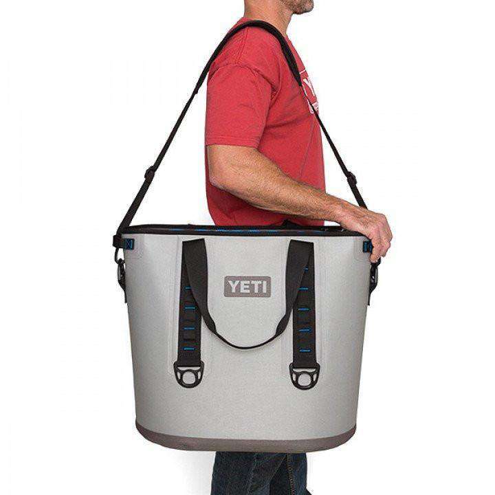 https://www.countryclubprep.com/cdn/shop/products/coolers-hopper-40-in-fog-gray-and-tahoe-blue-by-yeti-3.jpg?v=1578457996