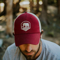 Bear Crest Activewear Trucker Hat in Red by The Normal Brand - Country Club Prep