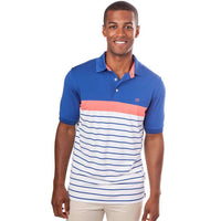 Ryder Stripe Performance Polo in Sunset Coral by Southern Tide - Country Club Prep