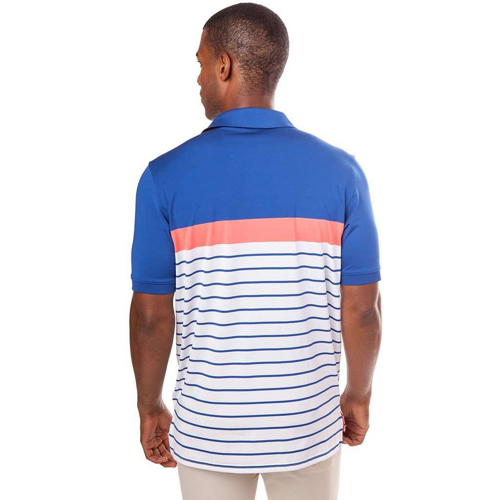 Ryder Stripe Performance Polo in Sunset Coral by Southern Tide - Country Club Prep