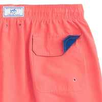 Solid Swim Trunks in Sunset Coral by Southern Tide - Country Club Prep