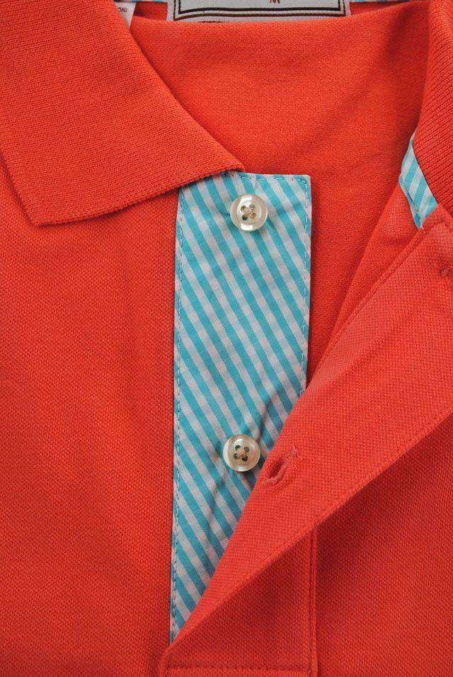 The Golden Polo in Orange by John Russell - Country Club Prep